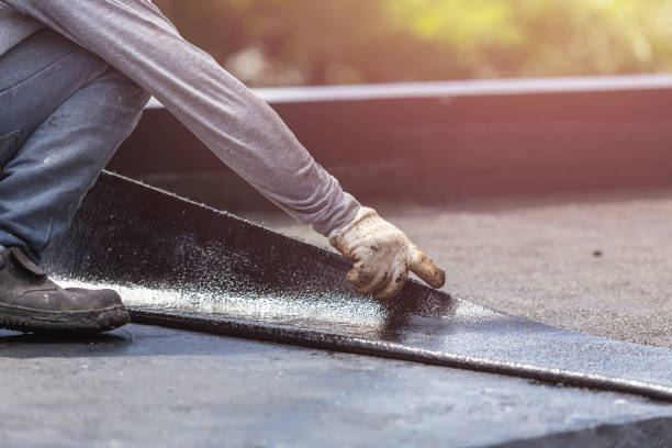 Professional Emergency Waterproofing technician working in Arrington, TN